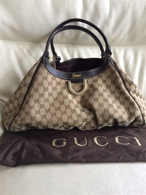 precio de una cartera gucci original|bolsas Gucci originales precios.